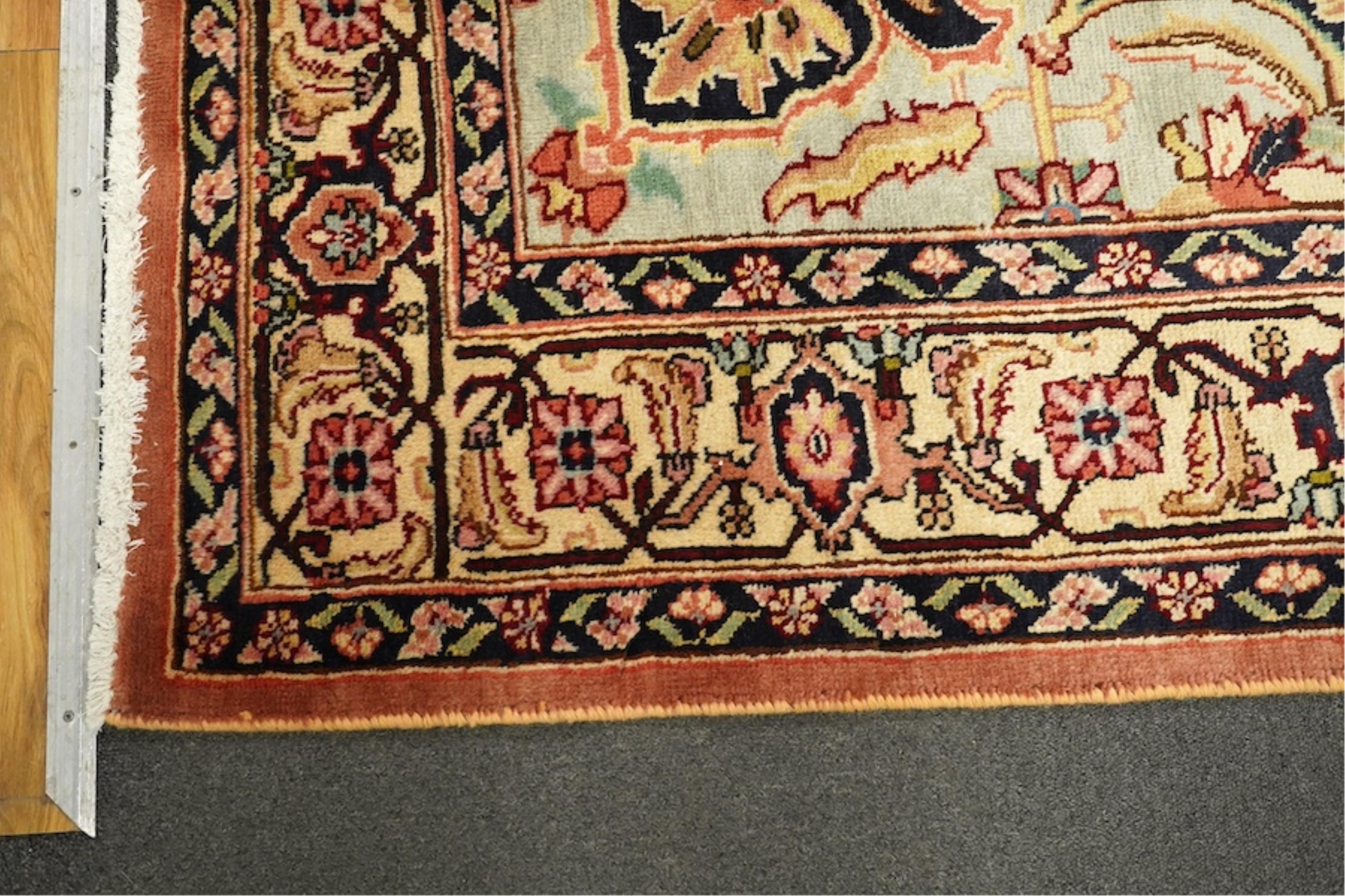 An Ardabil pale red ground carpet, 286 x 192cm. Condition - good